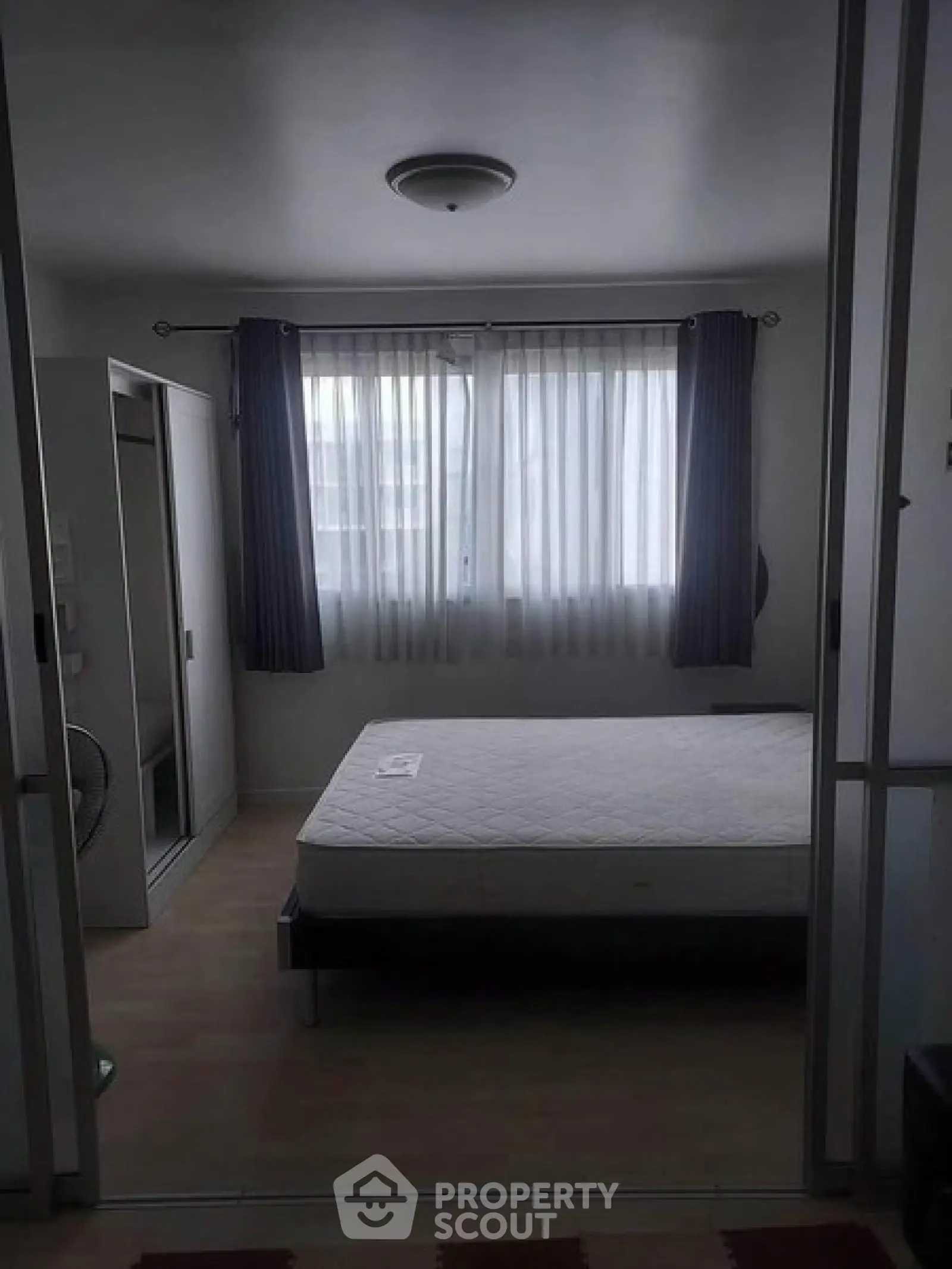 Cozy bedroom with natural light and minimalist design