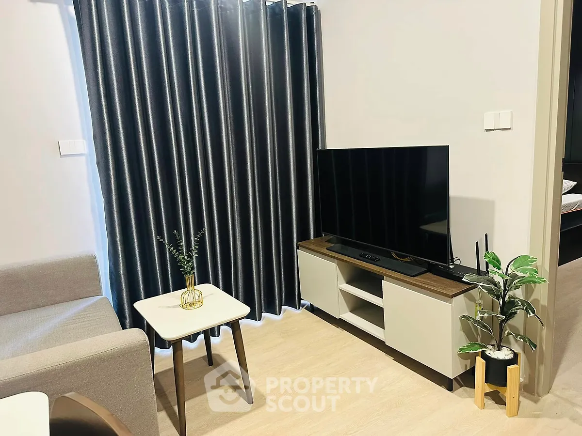 Modern living room with sleek TV setup and stylish decor