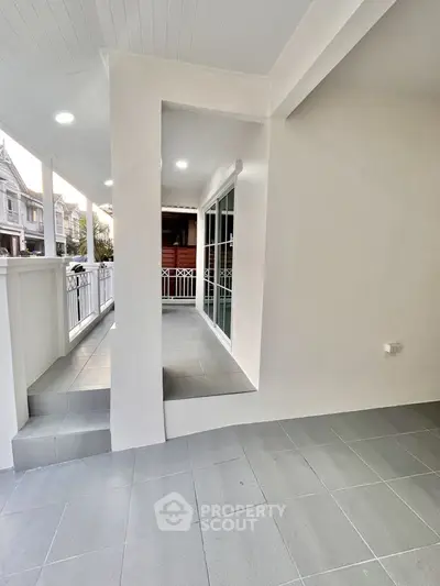 Modern balcony with sleek design and spacious layout in a contemporary home.