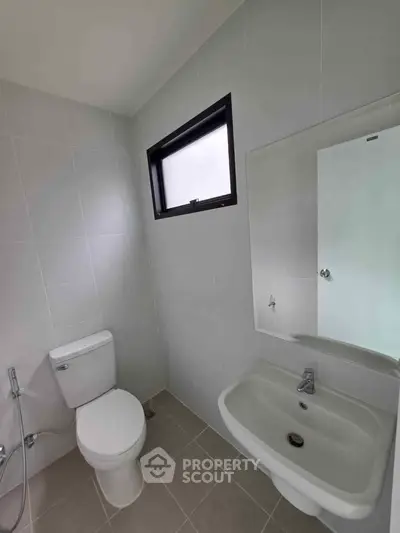 Modern bathroom with sleek fixtures and natural light