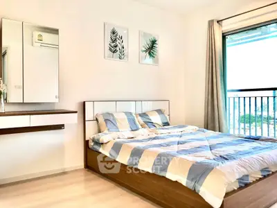 Bright and airy bedroom with modern decor and large window view.