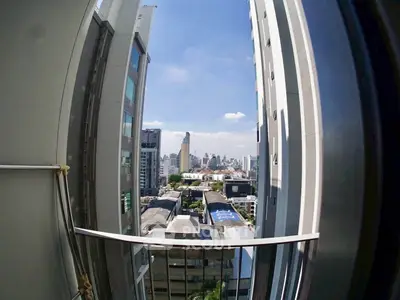 Stunning cityscape view from a high-rise balcony, perfect for urban living enthusiasts.