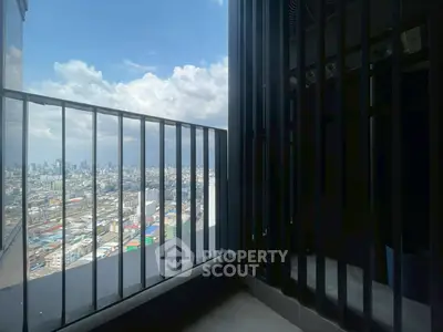 Stunning cityscape view from a modern high-rise balcony, perfect for urban living enthusiasts.