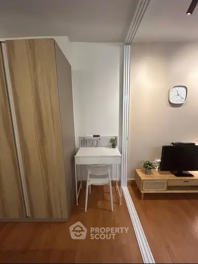 Cozy study nook with modern decor and wooden flooring