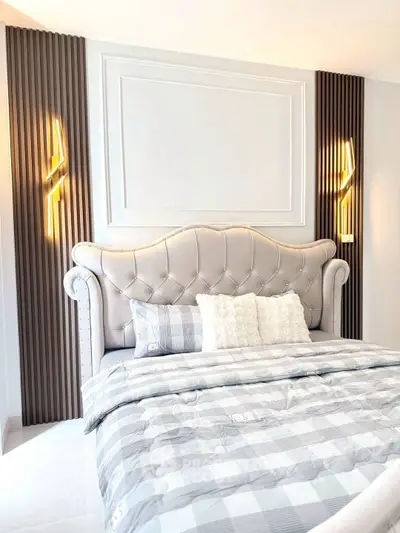 Luxurious bedroom with elegant bed and modern lighting