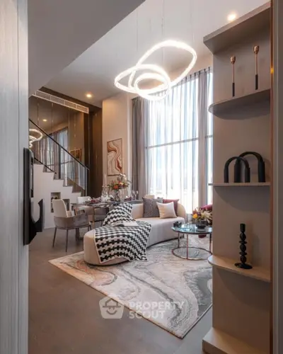 Luxurious modern living room with high ceilings and elegant decor