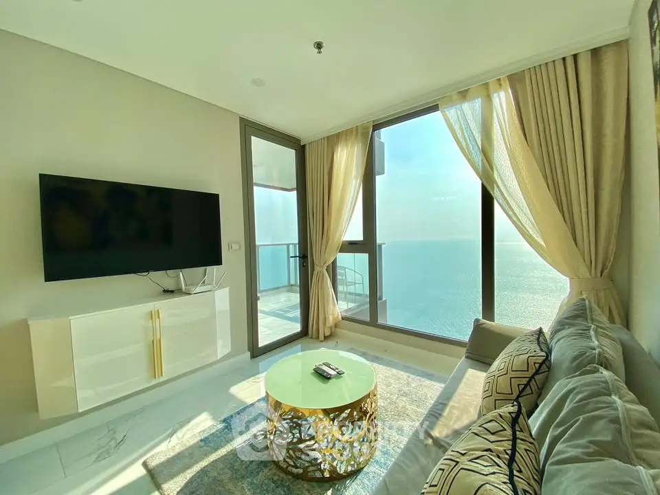 Luxurious living room with ocean view and elegant decor