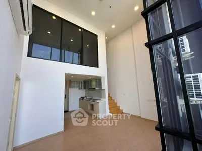 Spacious modern loft with high ceilings and open kitchen layout