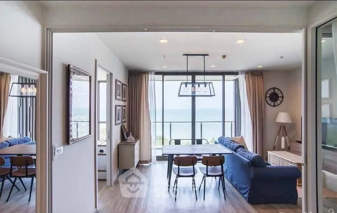 Spacious living room with ocean view and modern decor