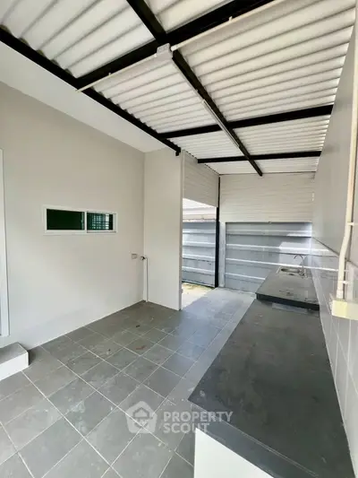 Modern kitchen with sleek countertops and open layout in a contemporary home.
