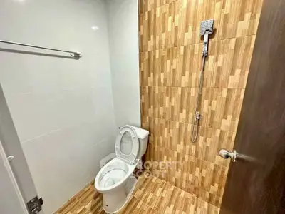 Modern bathroom with stylish tile design and sleek fixtures