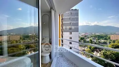 Stunning balcony view with mountain backdrop in modern apartment