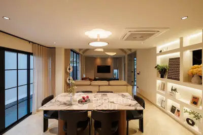 Luxurious modern living room with elegant dining area and stylish decor