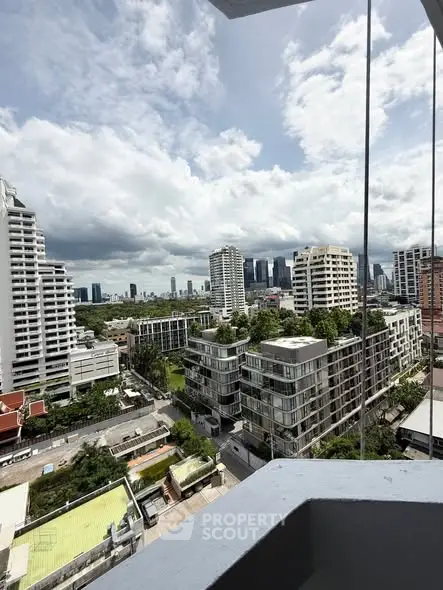 Stunning cityscape view from a high-rise balcony showcasing modern urban living.