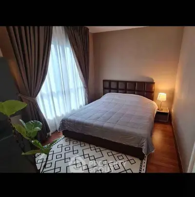 Cozy bedroom with modern decor and natural light