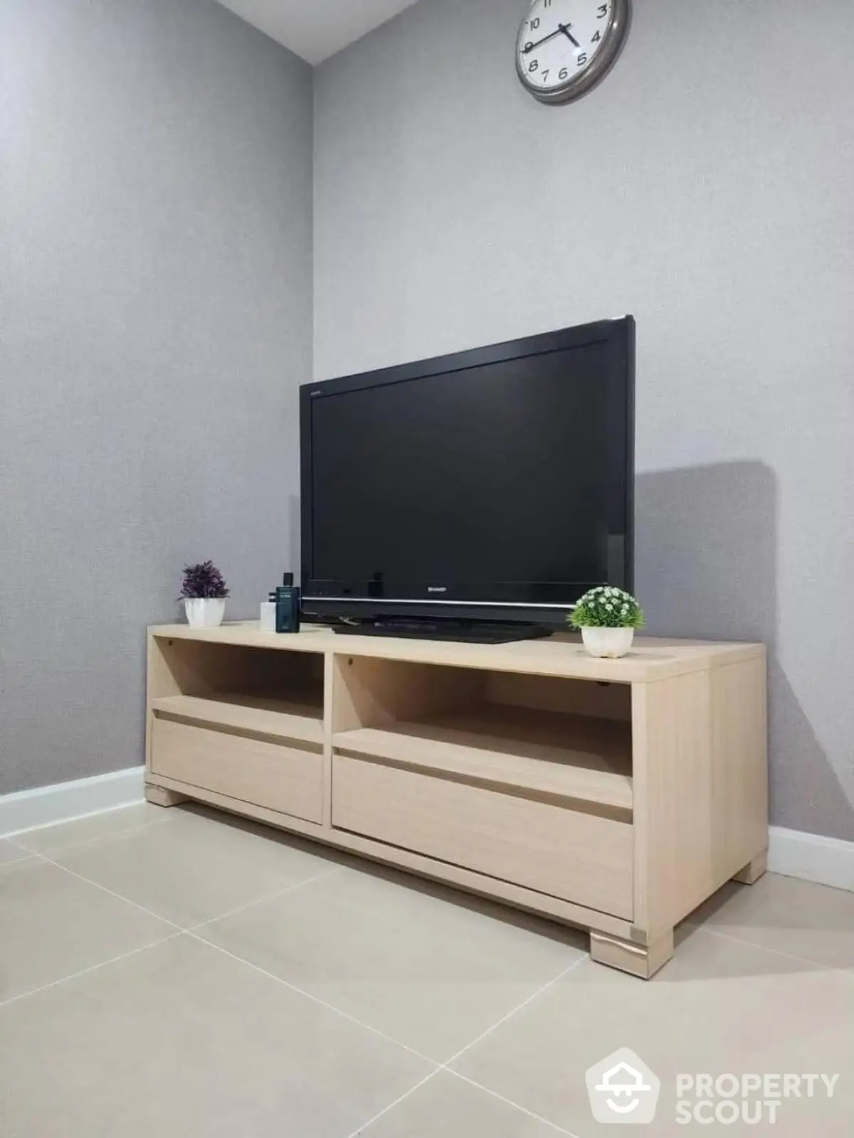 Modern living room with sleek TV stand and minimalist decor