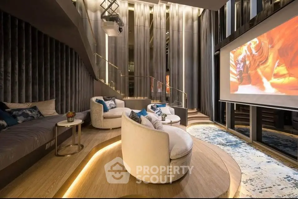 Luxurious home theater with plush seating and ambient lighting
