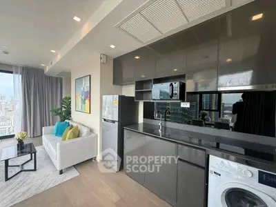 Modern open-layout kitchen and living room with city view, sleek cabinetry, and stylish decor.