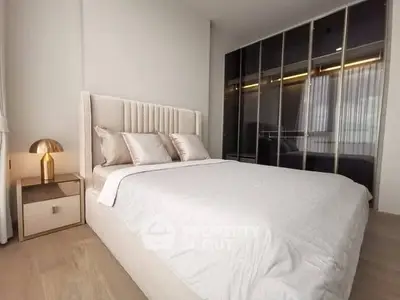 Elegant bedroom with modern decor and spacious wardrobe