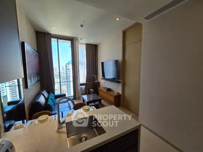 Modern living room with city view, sleek furniture, and open kitchen layout in high-rise apartment.