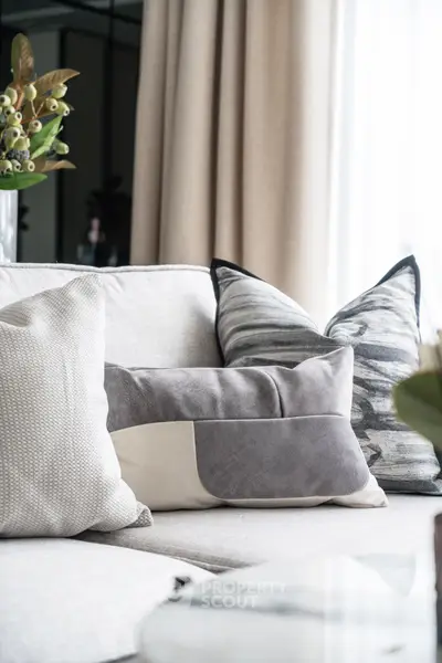 Elegant living room with stylish cushions and natural light