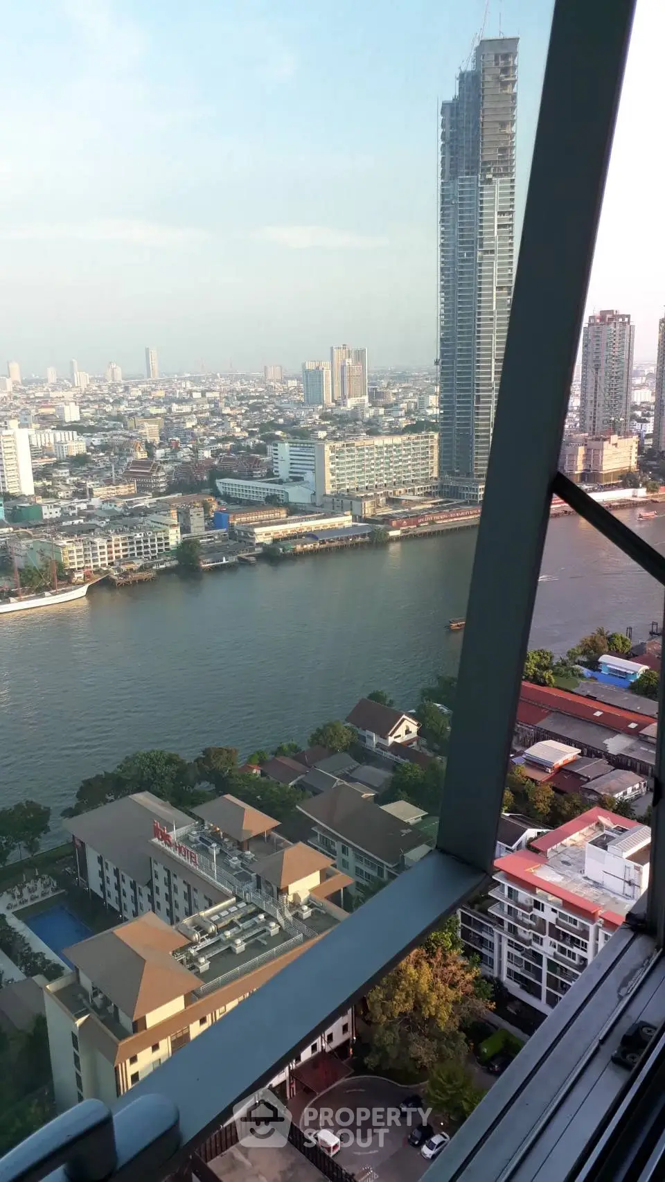 Stunning river view from high-rise building with cityscape backdrop