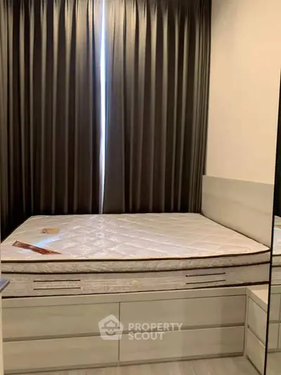 Cozy bedroom with modern design and ample storage space
