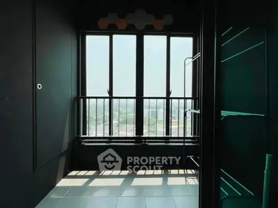 Modern balcony with panoramic city view and sleek black railing