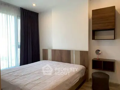 Modern bedroom with stylish wooden accents and natural light