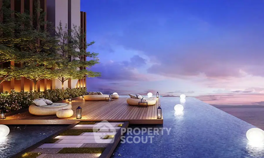 Luxurious rooftop infinity pool with stunning sunset view and elegant seating area.