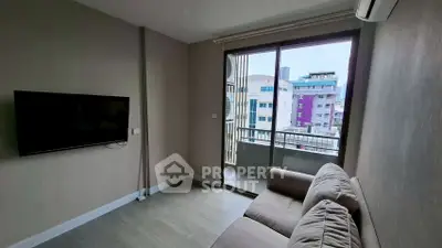 Modern living room with balcony view in urban apartment