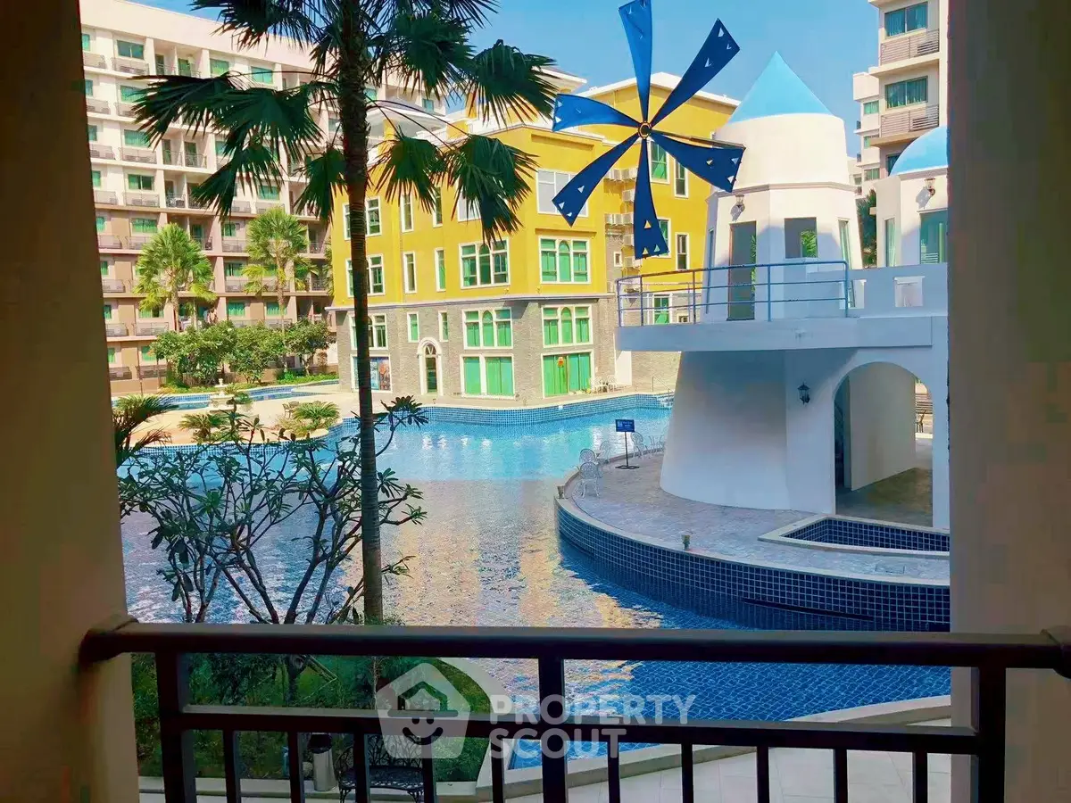 Luxurious poolside view with modern architecture and vibrant colors.