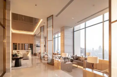 Luxurious high-rise living room with panoramic city views and elegant modern design.
