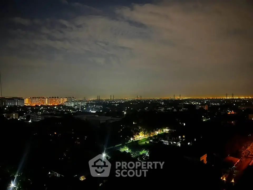 Stunning cityscape night view with illuminated skyline and serene ambiance.