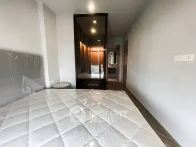 Modern bedroom with sleek design and ample natural light