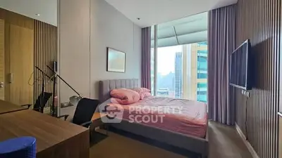 Luxurious bedroom with modern decor and stunning city view in high-rise apartment.