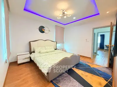 Modern bedroom with stylish lighting and elegant decor