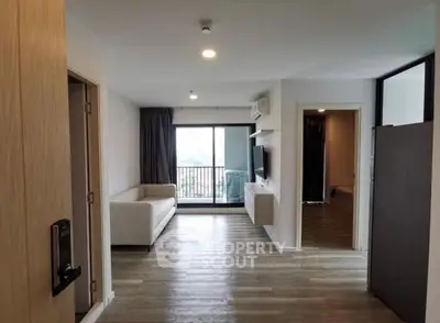 Modern living room with balcony view and sleek interior design