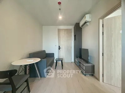 Modern living room with minimalist furniture and air conditioning