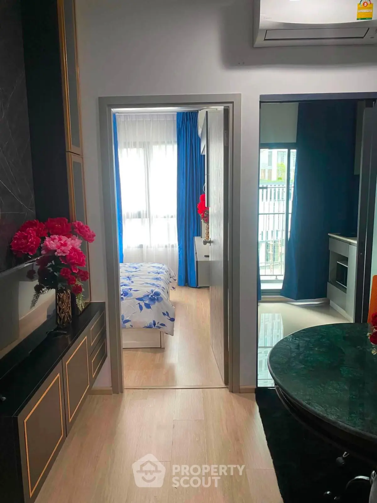Chic apartment interior with modern decor, featuring a cozy bedroom and stylish living area.