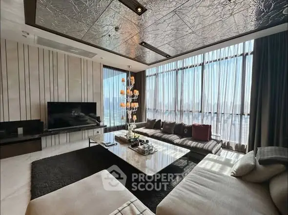 Luxurious living room with panoramic windows and modern decor