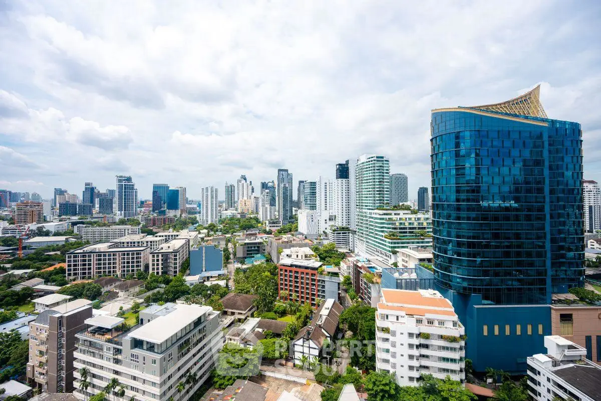 Stunning cityscape view showcasing modern skyscrapers and lush greenery, perfect for urban living enthusiasts.