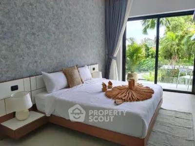 Luxurious bedroom with garden view and modern decor