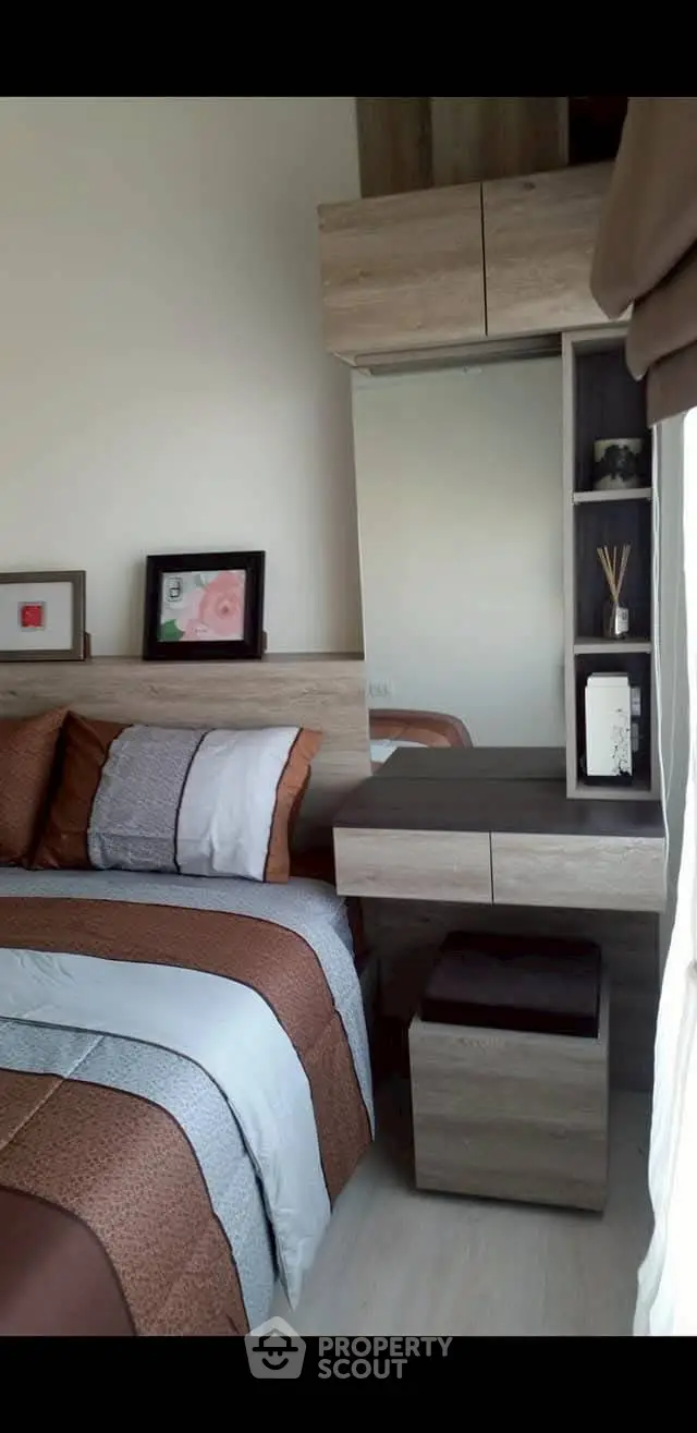 Cozy bedroom with modern wooden furniture and stylish decor