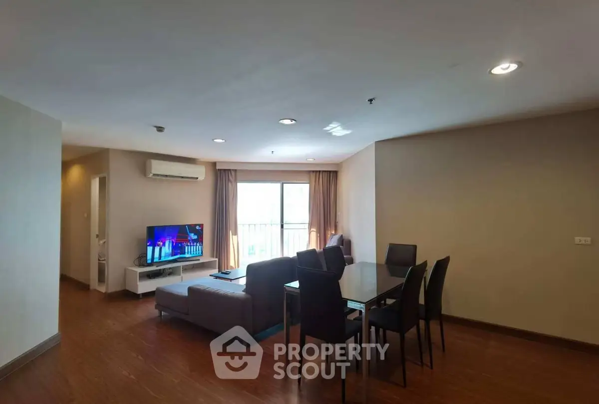 Spacious living room with modern furniture and natural light
