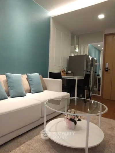 Modern living room with stylish decor and cozy seating area