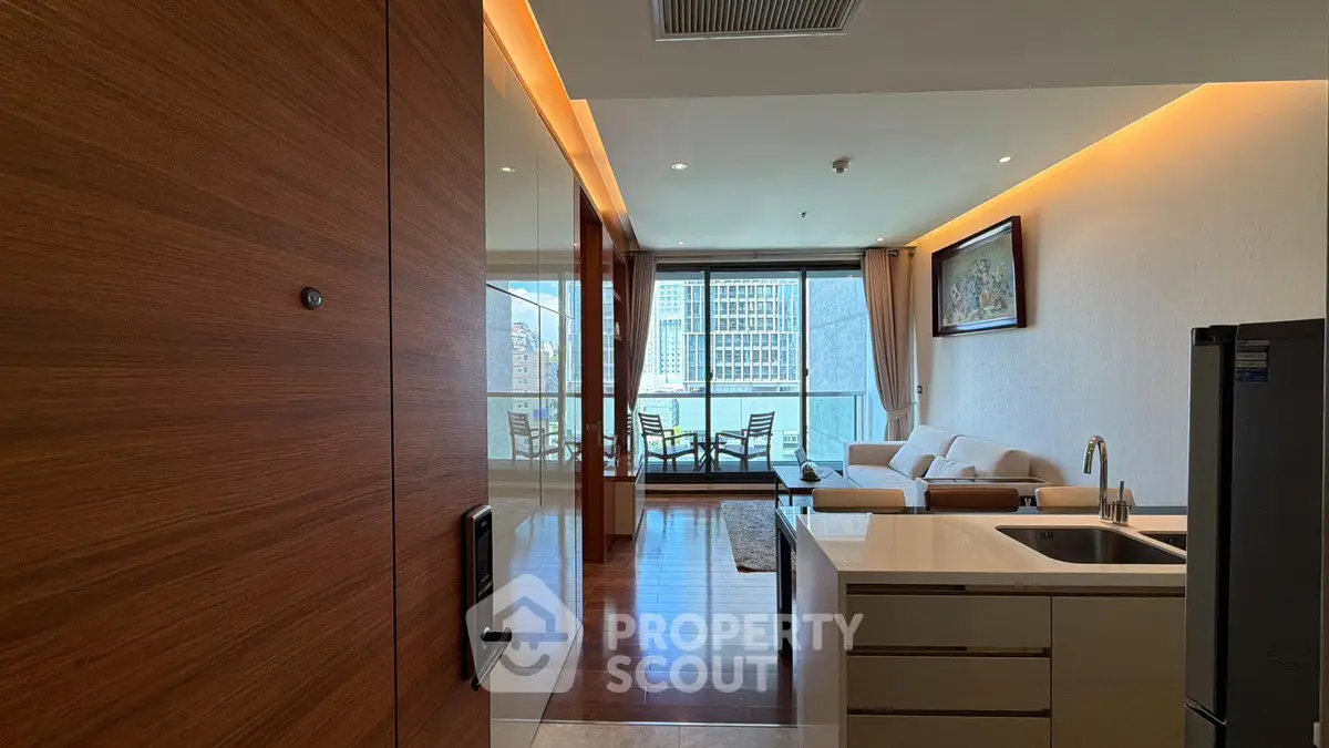 Modern open-layout apartment with stunning city view and spacious balcony.