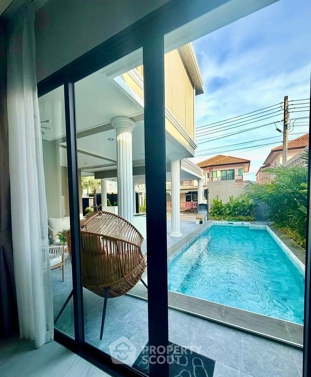 Luxurious home with private pool and elegant patio view