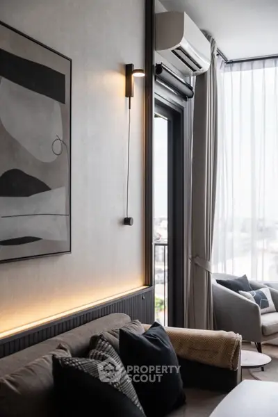 Modern living room with stylish decor and large window view