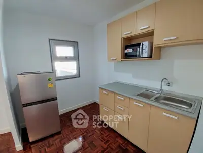 Modern kitchen with sleek cabinetry and stainless steel appliances